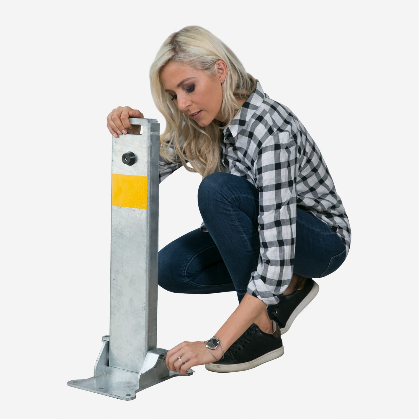 Woman unlocking a galvanised MyParking post at its base.