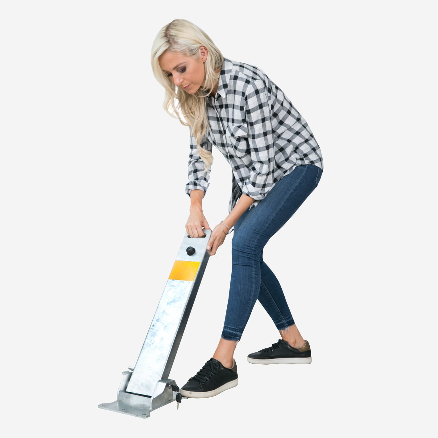 Woman lowering a galvanised MyParking post towards the ground.