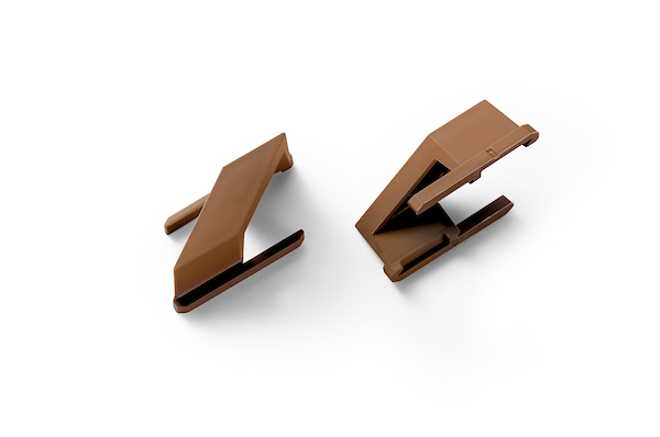 Gardenode Equinox PVC intermediate spacer for louvre slats in teak, product shown alone.