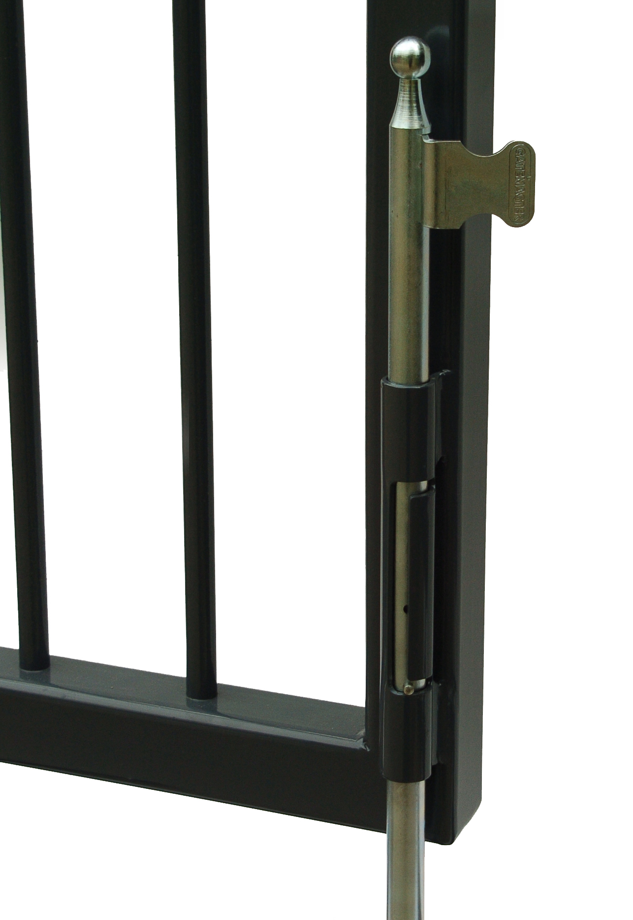 The drop bolt fitted to the closing stile of a black metal gate, the lifting handle at the top and the bolt lowered past the bottom rail