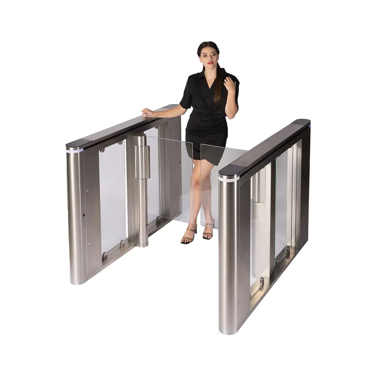 A woman in black walks through the Speedgate Kinetic between its stainless steel cabinets.