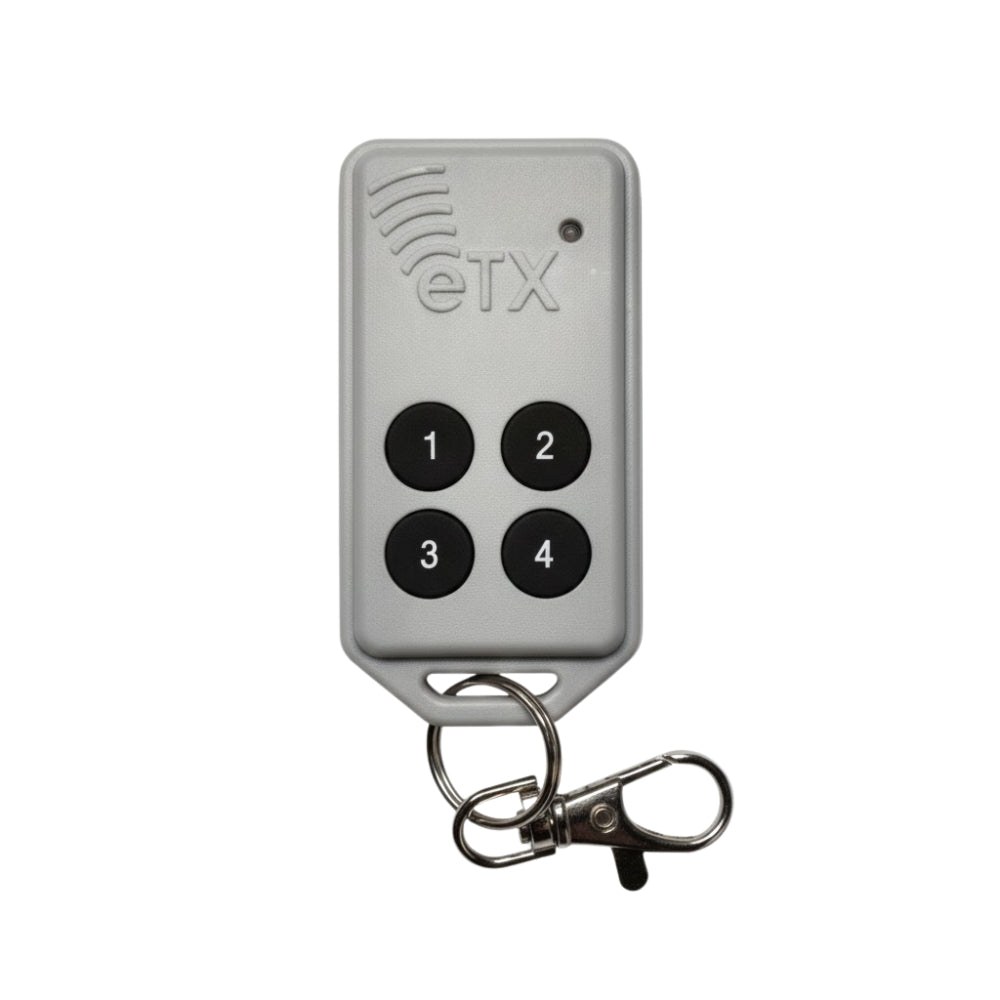 AES eTX four-button remote transmitter on a key ring