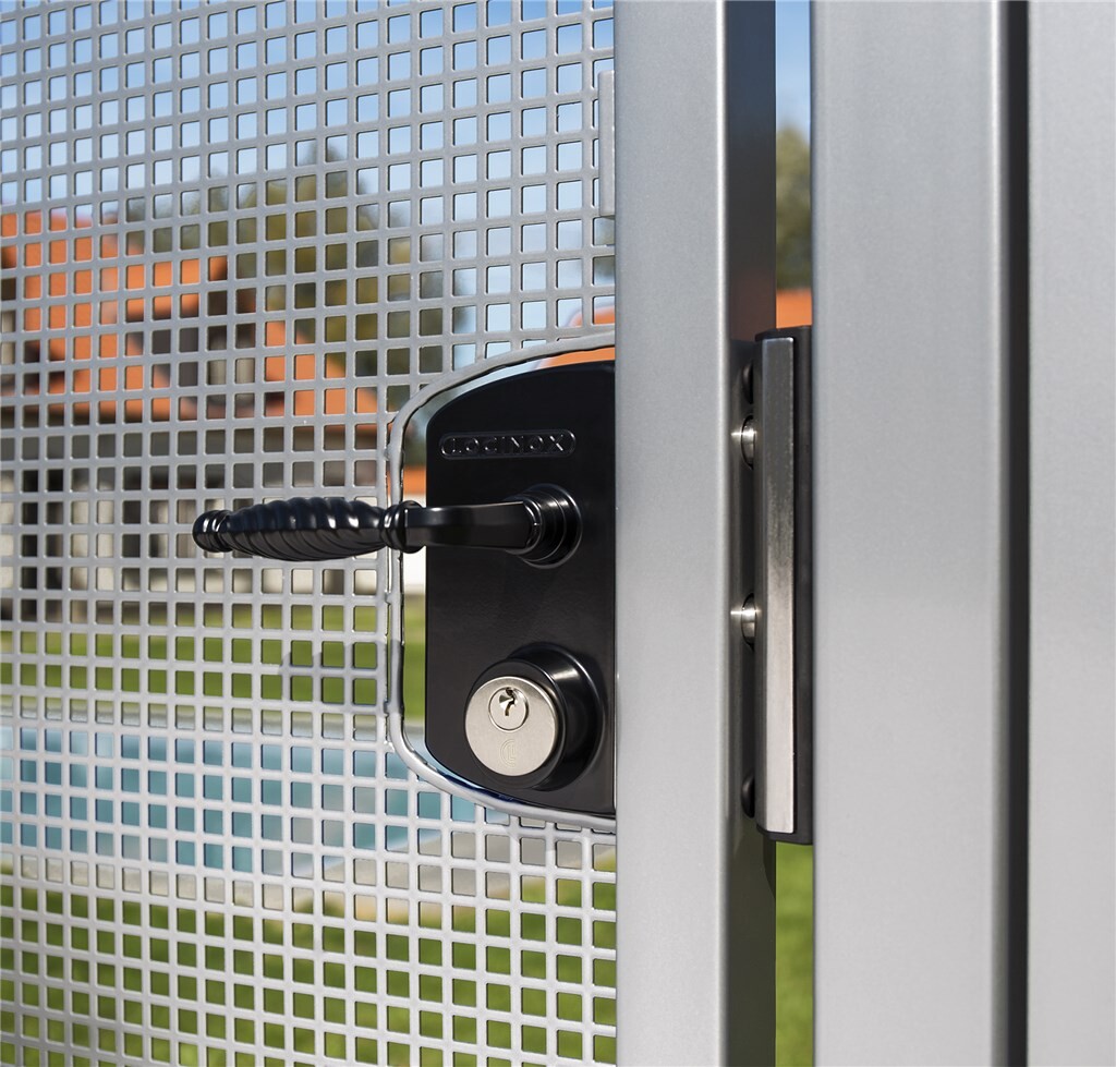 Black Locinox mortise cylinder gate lock on a perforated mesh gate