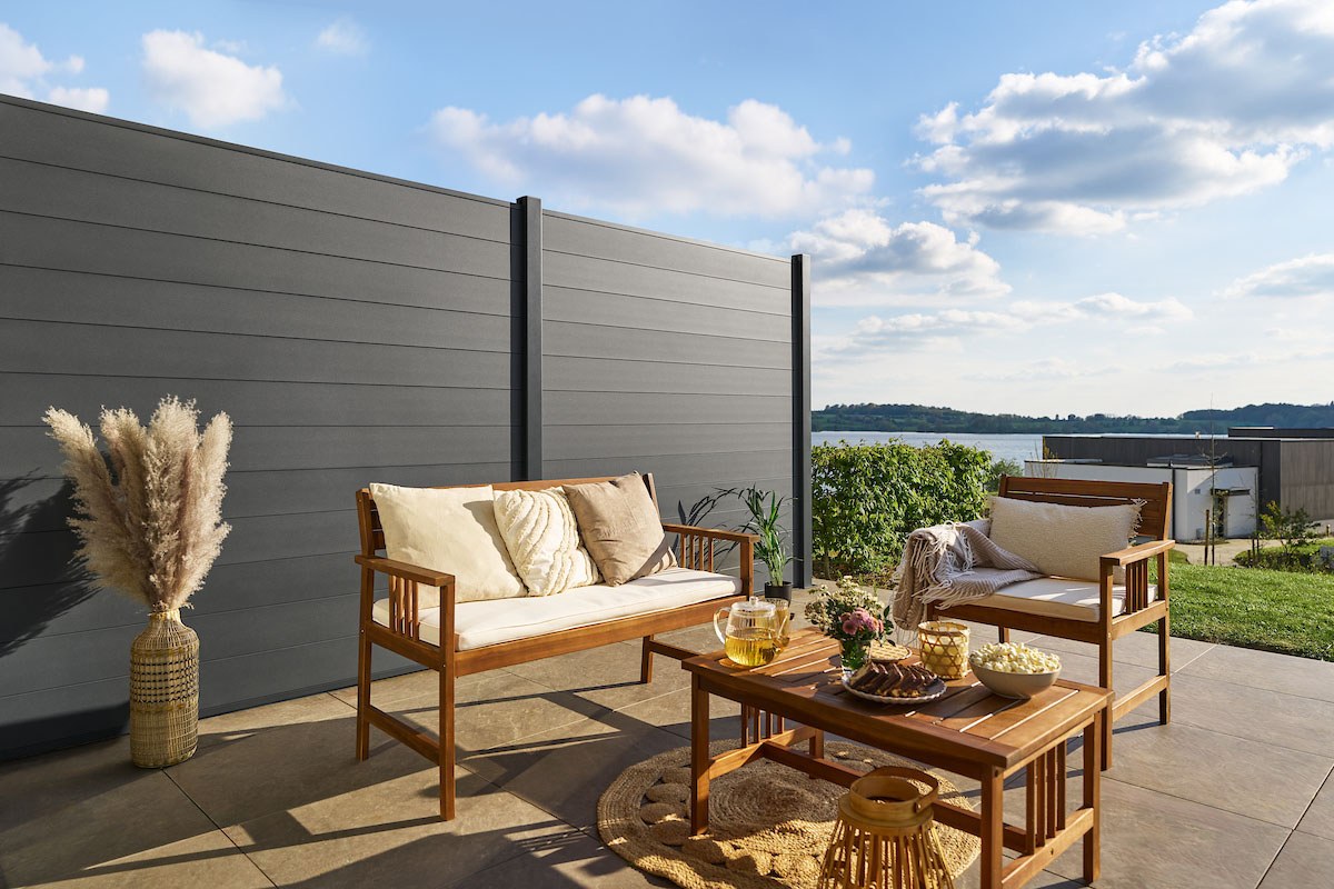 Gardenode Equinox composite slat fence around a patio