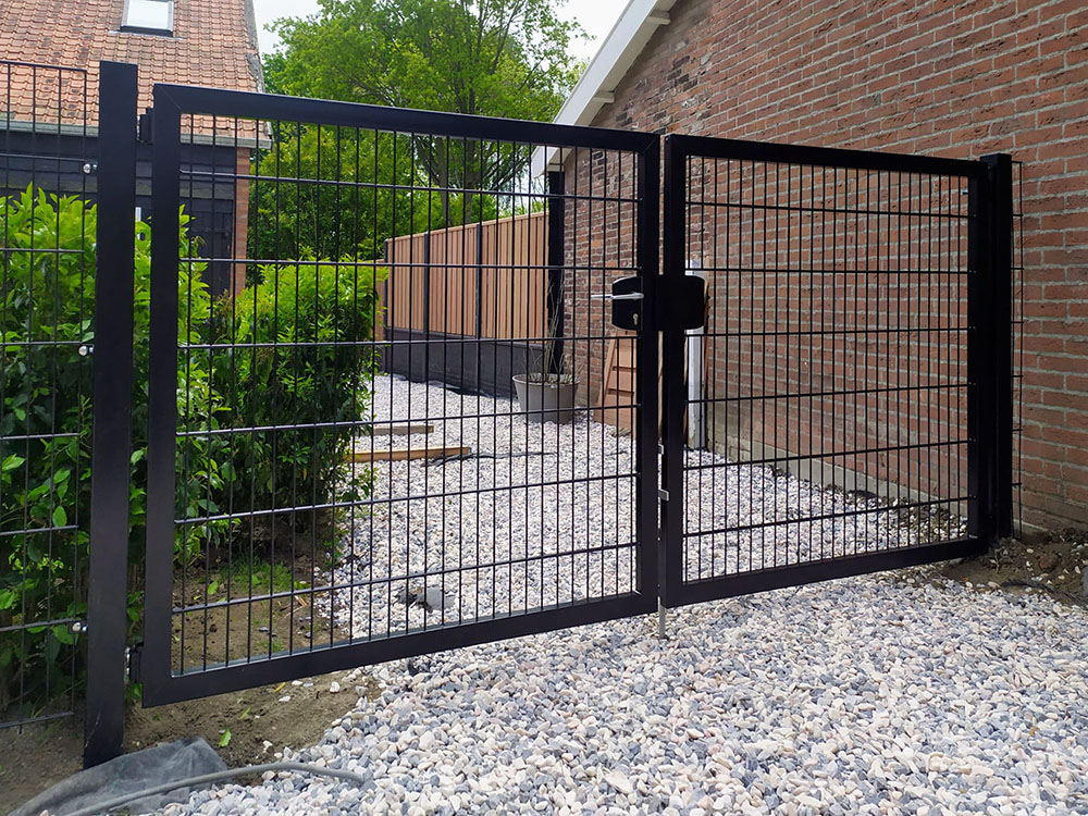 Professional double leaf gate installed at a site entrance