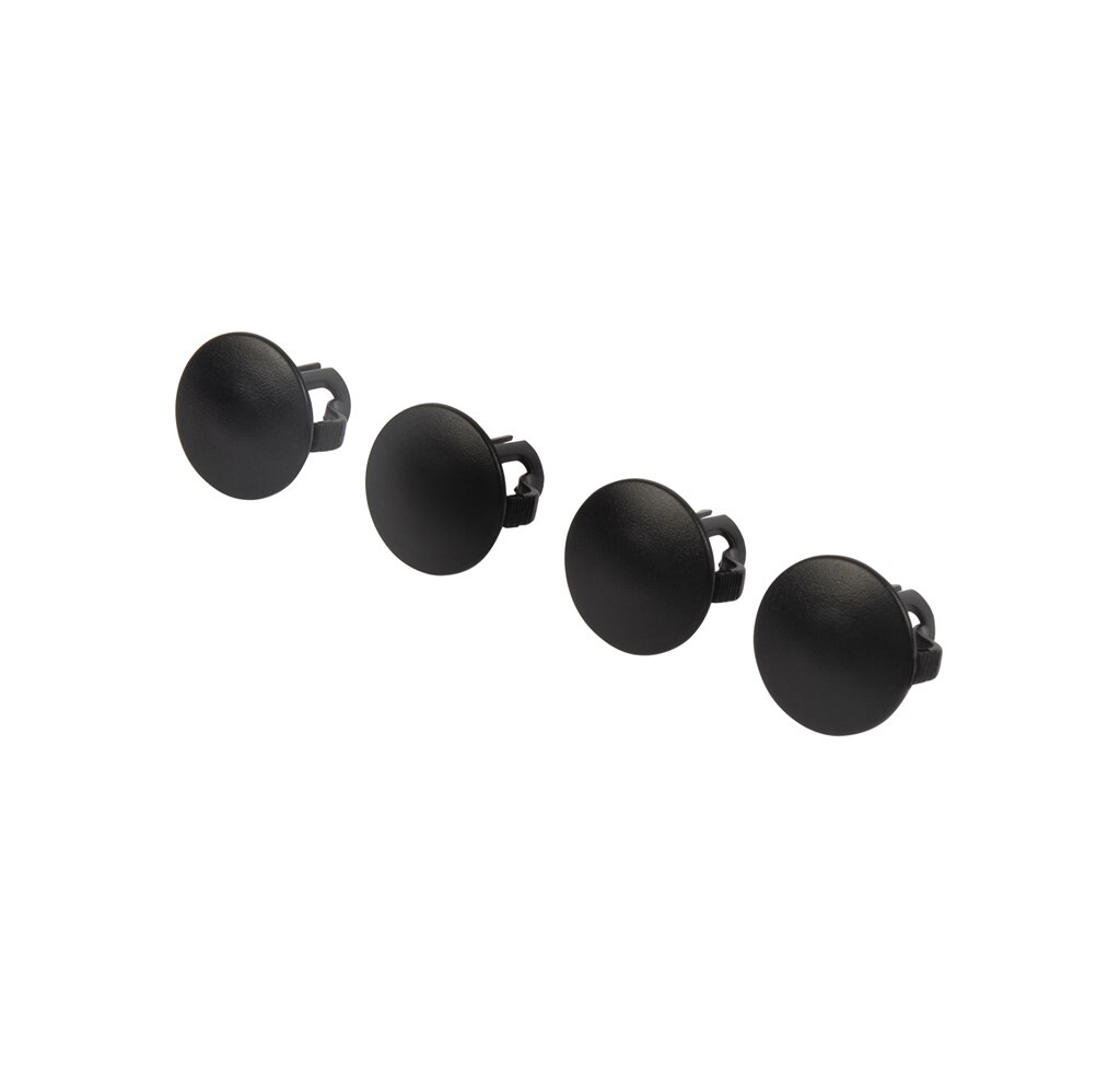 Black plastic cap covering an installation hole in a gate profile
