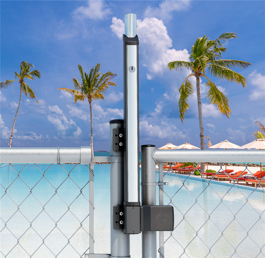 Fortima latch for round posts fitted on a galvanized round post of a chain link pool gate
