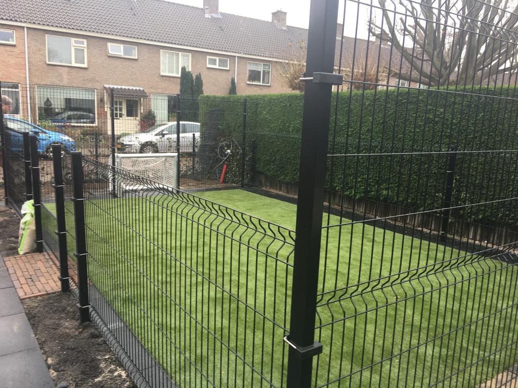V mesh panels used around a small sports cage