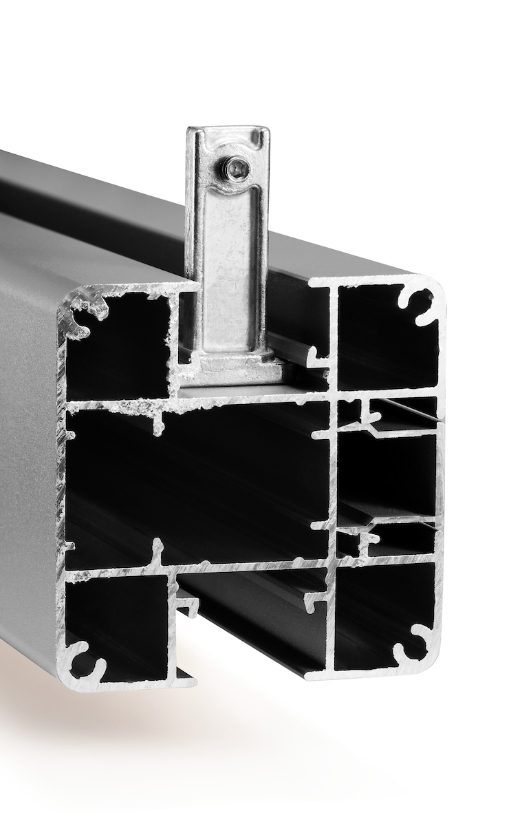 Gardenode Equinox levelling shim plate for fence posts, installed on a fence.