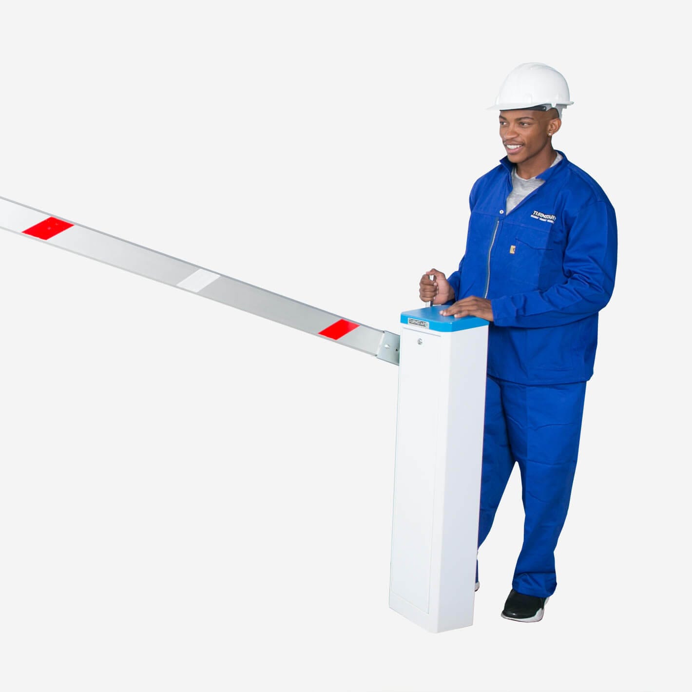 Worker in blue overalls raising the boom of a white Velocity Manual barrier with a blue lid.