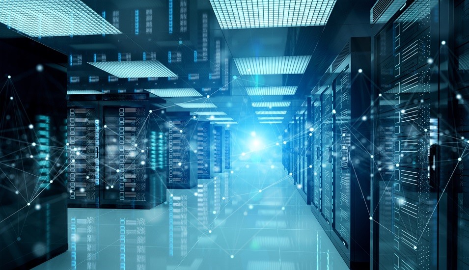Rows of server racks in a data hall under blue light