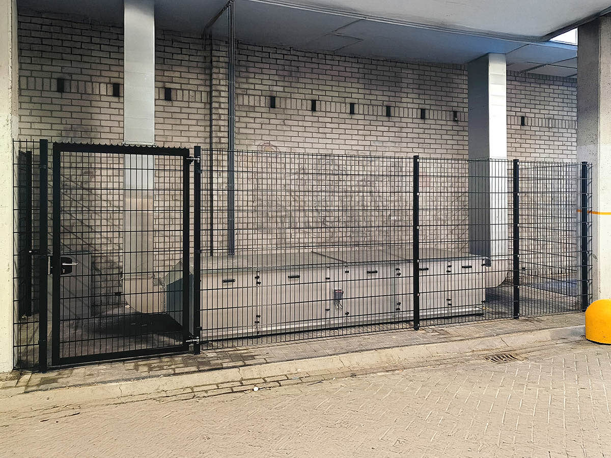 Security fence and gate enclosing cooling and ventilation equipment